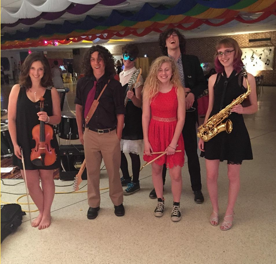 During the 2015 Music Formal at PFMS, Here All Week performed a short set to kick of the dance. Here they are post performance. From left to right: Ally Ellis, Matt Wherley, Aaron Gayan, Charlotte Hatch, Joe Caldwell, Anna Hirsch. Photo credits: Katie Taylor
