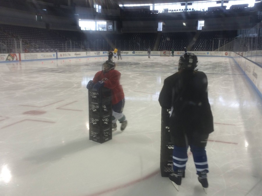 Caitlin Baran (left) and Lavender Capenos (right) hit the ice along with 7 other players this Sunday when Happy Valley Special Hockey kicked off their first practice at noon. 
