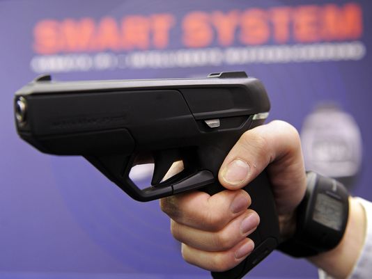 A smart gun is displayed at a conference in 2010
(Photo: Joerg Koch, AFP/Getty Images)