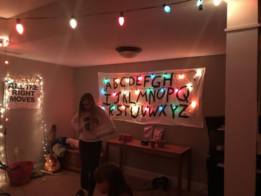 Merel Padt sets up for her friend Grace Roeshots Stranger Things viewing party. 