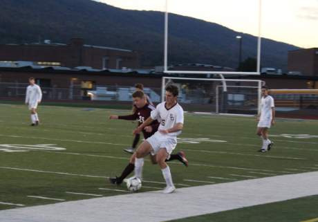 Jacob Whipple, a senior(46), defends against Altoona on Halloween night. Whipple felt the team did a good job of “taking chances while still maintaining possession.” Sadly, State College returned from Bald Eagle with a loss of 0-1.