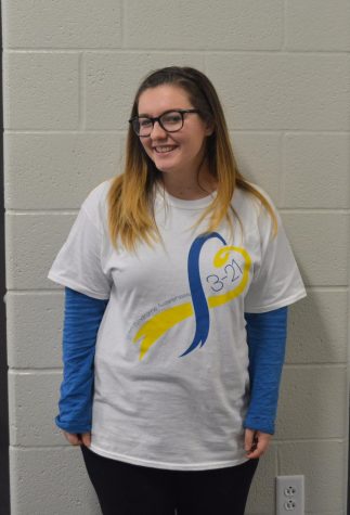 Senior Rebecca Stroschein wears her World Down Syndrome day shirt. World Down Syndrome day takes place on the 22nd of March each year. “I decided to wear the shirt to help raise awareness for World Down Syndrome Day. Through Best Buddies, I have met so many incredible people with Down syndrome and I am so happy our club found a way to spread the word,” said Stroschein. 
