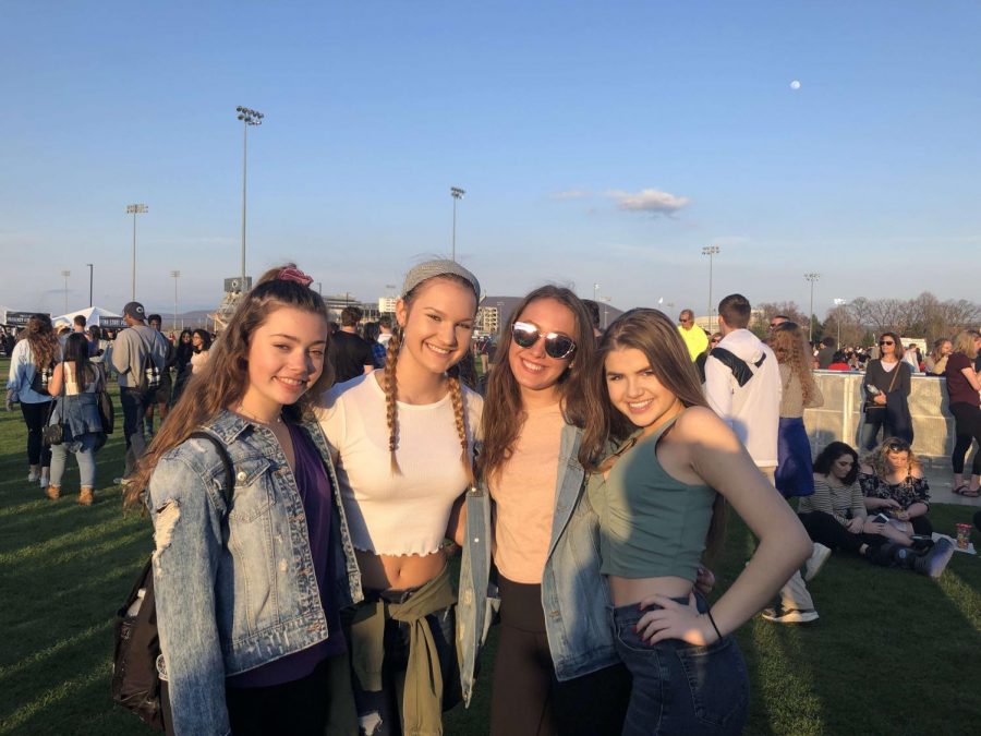 State High Freshman, Sammie Dunlap, Meg Felsmann, Emma Ryan, and Payton Treaster enjoy the sunshine before the rain at Moving On. Freshman Emma Ryan said, “I had a super good time with my friends,” in regards to her experience at Movin’ On.