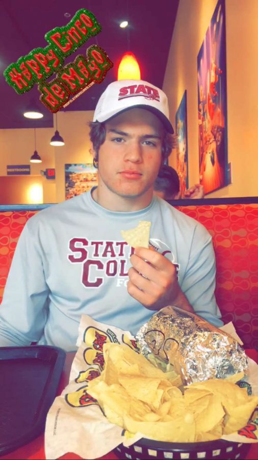 Ryan Domico, an 8th grader, Celebrates Cinco de Mayo at Moe’s Southwest Grill. The restaurant gave out free t-shirts. Kyle Domico, sophomore, said, “We had a ton of fun celebrating the holiday a Moe’s.”
