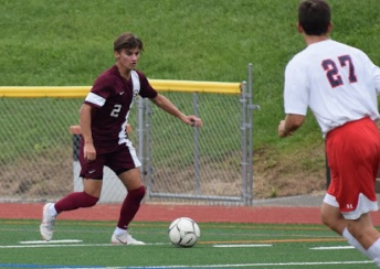 Picture Quote: Junior, co-captain, Marc Rodgers takes on defender during home game against Red Land. “As long as we play as a team we’re going to be pretty hard to beat.” Rodgers says. The Little Lions seek to repeat as Mid-Penn Commonwealth Champions once again this year.