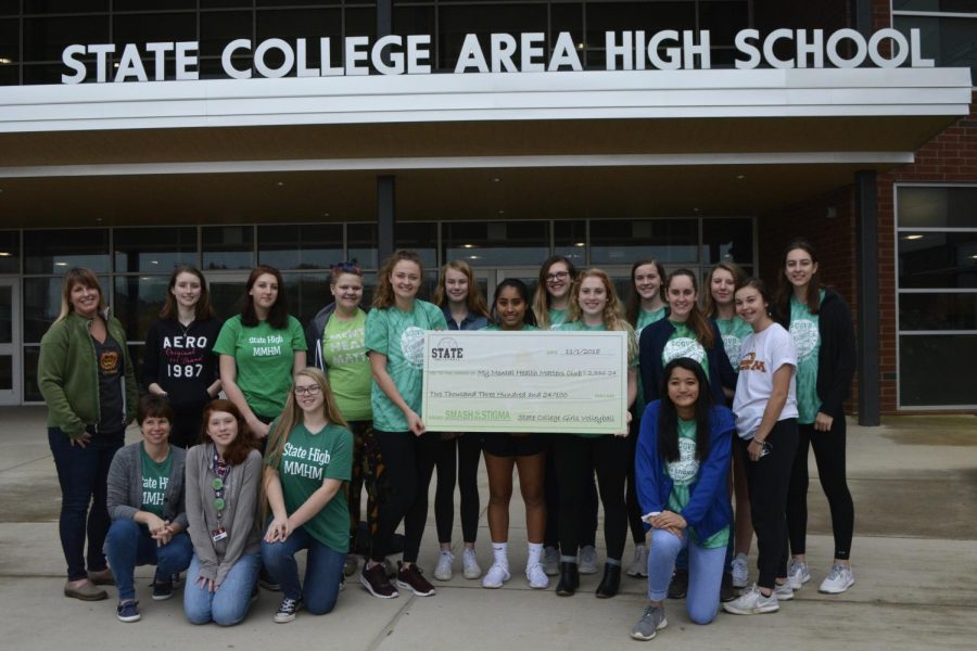 The Volleyball team and MMHM club stand together to present their check  for the money raised during the Green Out game. 

First row from left to right: Suzanne Lyke, Hailey Steele, Gwyneth Jones and Emi Shukla.

Second row left to right: Jess Irwin, Anjelica Rubin, Leah Henderson, Katie Finlin, and Maria Chapman.

Third row from left to right: Jennifer Evans, Sarah Hart, Isadora Drager, Jessica Griel, Anna Witmer, Mariah Airey, Abby Fozard, Samantha Shala, and Claire Jordan. 