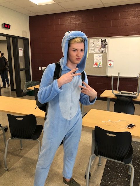 Lucas Monroe, junior, dressed in his onesie for School Spirit Day on Halloween. Many students dressed up in their creative costumes at State High for Halloween. 