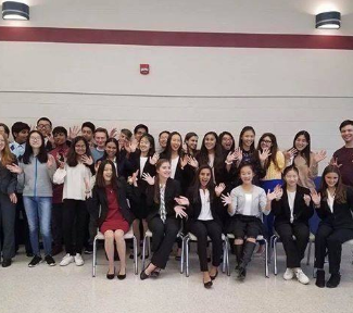 With cheery smiles after the tournament ended, the State High Forensics Team poses for photos. “It was so much fun and a great learning experience for any new novice forensics people,” freshman Tanisha Mal, who got 1st place in Declamation, said. “I would wholeheartedly recommend this experience to others.” 