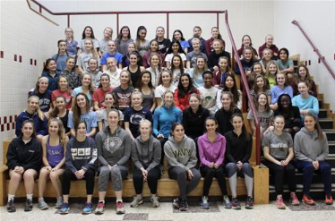 The girls track and field team poses at the beginning of the season. Senior Kileigh Kane said she is, excited to spend time with my team and coach, set new PR’s, and practice toward my goals I have set for the season