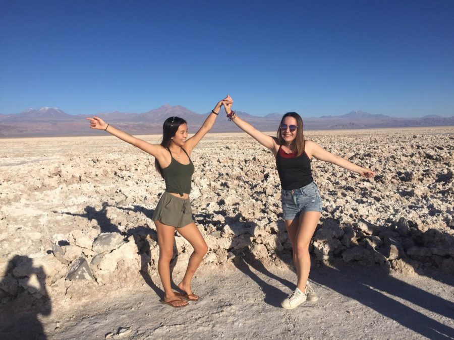 Joy Zhu, junior, poses with her German friend Maya Frodi, before sandboarding. Zhu traveled to San Pedro Atacama Desert while on her exchange program in Chile. “All the trips were so exciting with my exchange friends and forever bonds were formed there,” Zhu said. 
