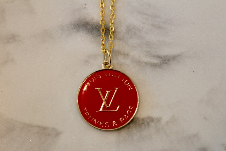Authentic Red Louis Vuitton LV Trunks and Bags Charm Necklace ($185) for sale on senior Zoe Browns Etsy page. Brown started making jewelry in February 2019 as a hobby and a way to make extra money. It’s something I enjoy doing, Brown said. It’s just something I like to do and making money off it is added.