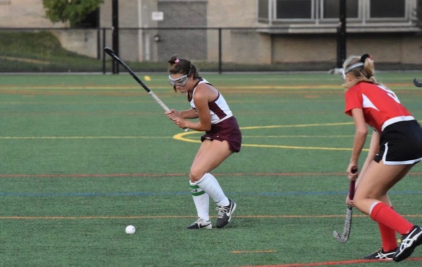 Maddie Tambroni, junior, prepares to pass the ball during field hockey home opener. The Lions fell 2-1 to Cumberland Valley. “I know that if we get the right skill set down we can beat them the next time we play them,”  Tambroni said.
Photo courtesy of Charlie Biddle 
