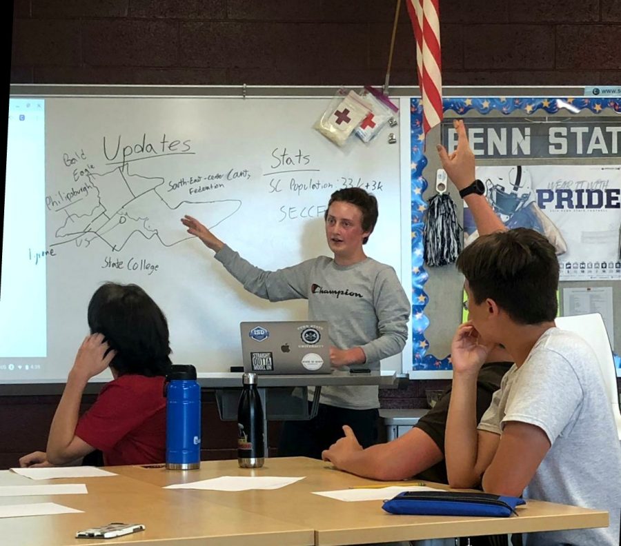 Vice President Ben Brauser with new members of Model UN, discussing how to resolve tensions with Bellefonte in this hypothetical scenario. “The Model UN Clubs seems very interesting and relevant,” Gregor, a new member to Model UN, said. She encourages all high school students to come to a meeting in the future.