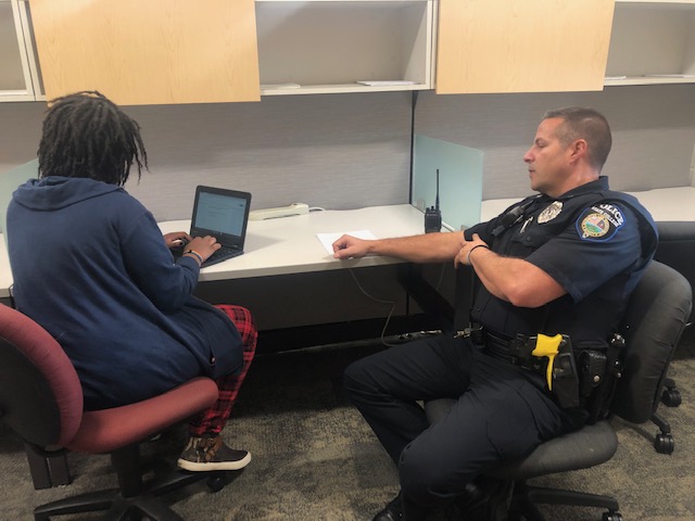 Nico Rodriguez speaks with Officer Aston on the topic of vaping. A former Mt. Nittany Middle School student commented that last year he would walk in on many students vaping in the boys bathroom.