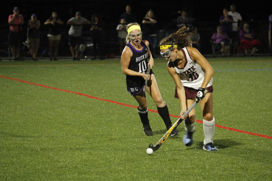 Johannah Lee, junior, carries the ball down the field. Lee scored one of the four goals on the October 2nd victory against Mifflin County. We are grateful for all they have contributed (on and off the field), and it has been an honor to play with them, Maddie King, junior, said of the seniors. 
