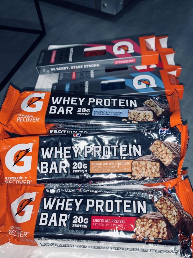 A display of Gatorade Protein Bars and Energy Chews. These snacks coincide with Mckenzie Truit’s, State High Athletic Trainer, tips for student-athletes. “ Protein is important and vital to optimize performance,” Truit said.