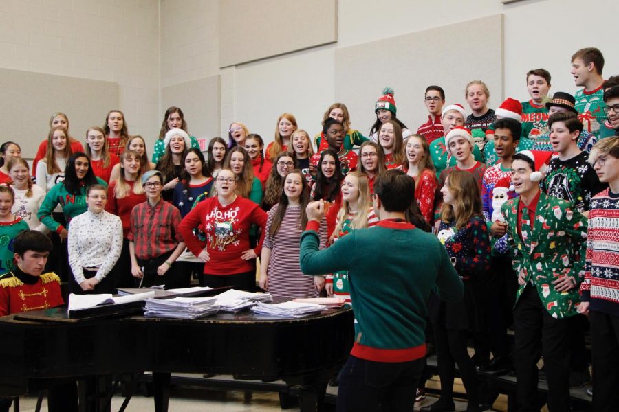 State High Choirs rehearse Mariah Carey’s “All I Want For Christmas Is You” before going on stage to perform. This song featured senior Caylee Thompson, and was popular among both the audience and students.  “Hearing Caylee sing ‘All I Want For Christmas Is You’ was so good and she gave me chills,” junior Anna Farris said.