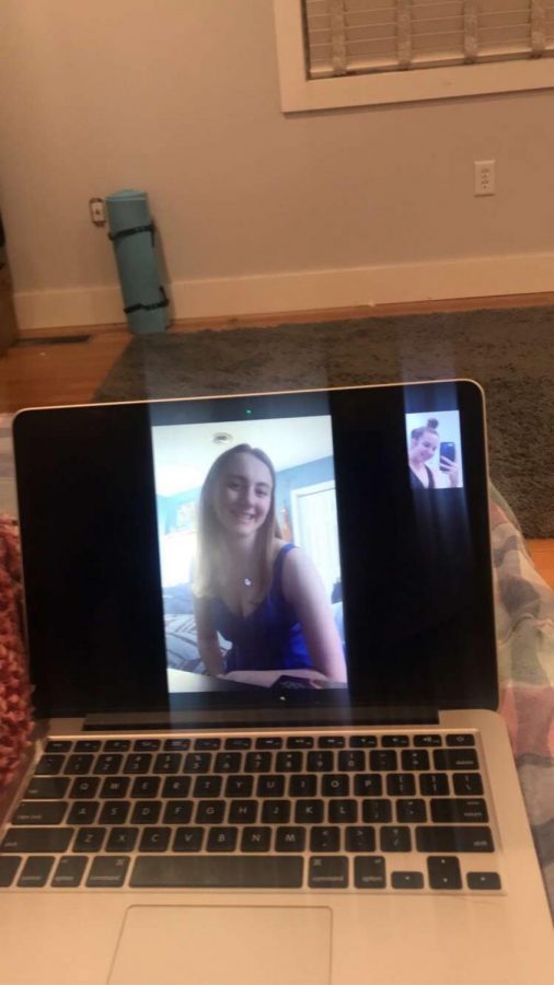The photo shows a moment that Kendall Kleinman captured during her virtual prom with fellow senior Katia Fuller. “Initially I was a little bummed about prom being cancelled because I had already bought my dress, but I realized in the grand scheme of things this is a small loss,” Kleinman said. 
