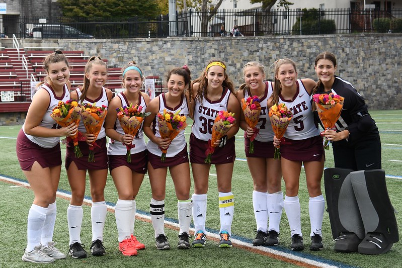 Photo taken at Memorial Field Oct. 3rd. The field hockey seniors(pictured left to right) Lizzie Paterno, Jena Zeiler, Isabella Parillo, Maddie Tambroni, Johannah Lee, Rebecca Bonness, Nicole Zeiler, and Bayla Furmanek pose together with their flowers. 