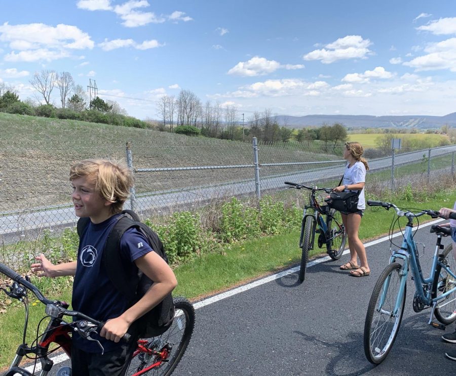 State+High+sophomore+Caitlyn+Keiter+took+up+biking+during+the+pandemic+as+a+way+to+get+outside+and+get+some+exercise.+Keiter+%28right%29+and+friends+came+to+use+their+bikes+on+a+regular+basis+during+quarantine.+
