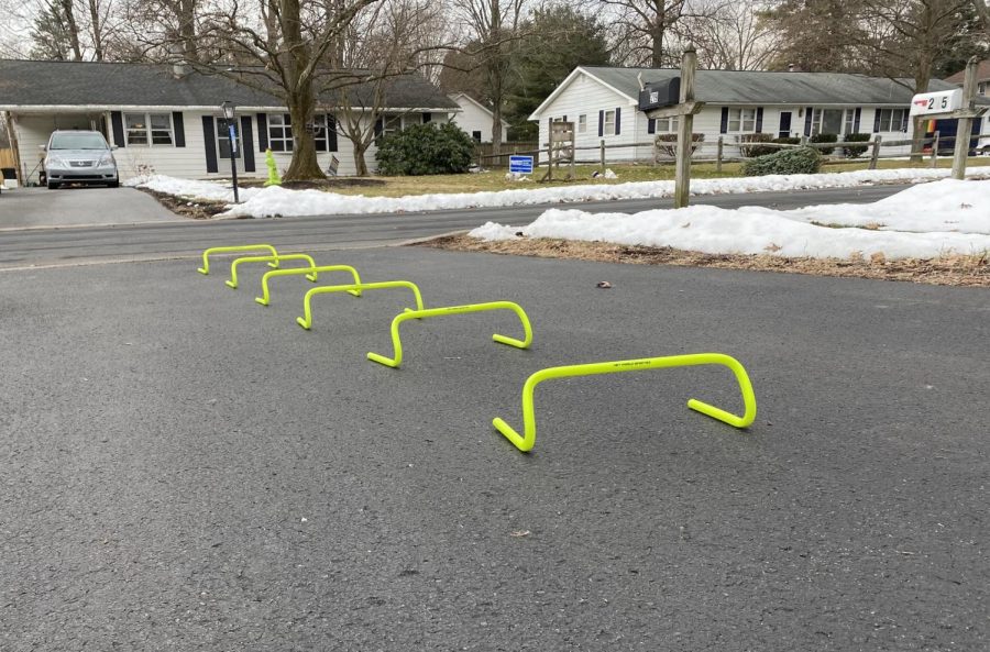Pictured are banana hurdles. These hurdles are used during practice to improve knee height, control feet movements, and work on the dorsa flex while running. 
