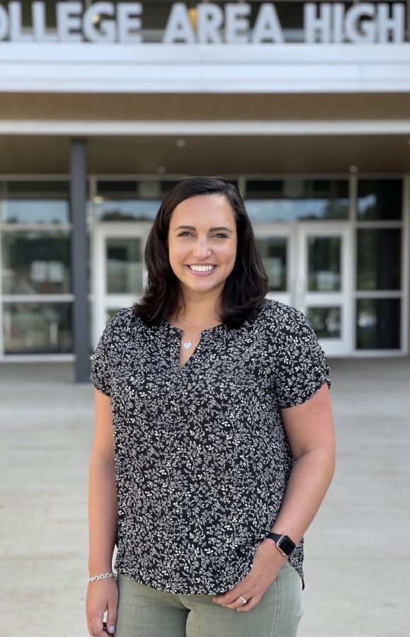 Mrs. Elisabeth James poses in front of State High for a professional portrait. James joined the Office of Equity and Inclusivity as the State College Area School District’s first-ever mental health clinician for the 2021-2022 school year.