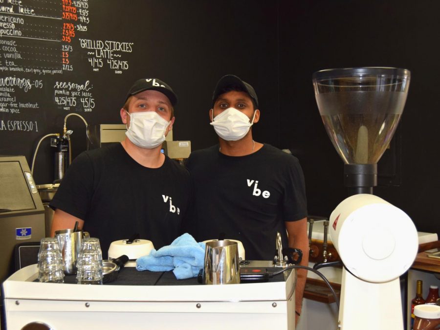 Vibe Coffee Co. co-founders Ethan Steiger (left) and Tameel Noel (right) pose behind the counter of their bustling coffee shop on Sept. 24. Located at 401 W. Beaver Avenue, Vibe Coffee Co. is the latest addition to State College’s coffee scene.