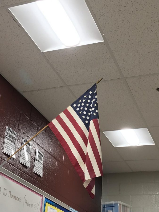 Pictured+is+an+American+flag+hanging+in+room+E133.+