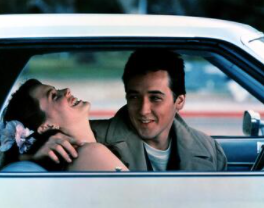 A still from Say Anything, a romantic comedy released in 1989 starring John Cusack as Lloyd Dobler and Ione Skye as Diane Court.