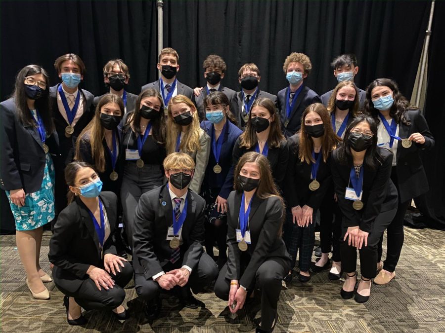 State+High+DECA+members+with+top-six+scores+in+their+events+pose+after+becoming+Mini+Award+Winners+at+the+PA+DECA+state+conference.