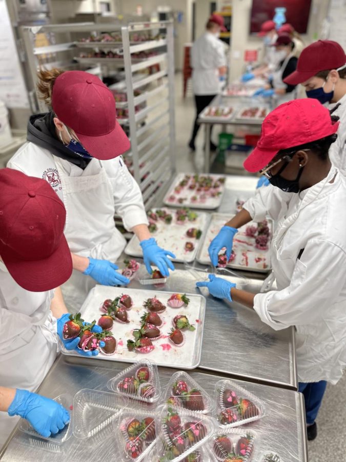State High Culinary students work on decorating chocolate covered strawberries prior to Valentines Day. 