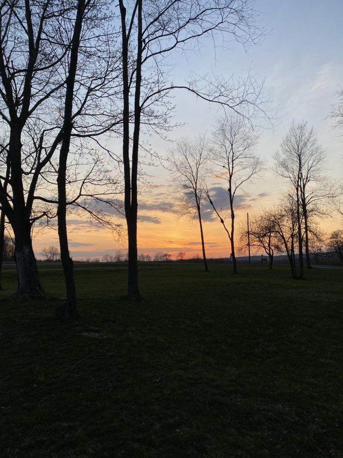 The sun sets on the upper part of Circleville Park on April 7, 2022.