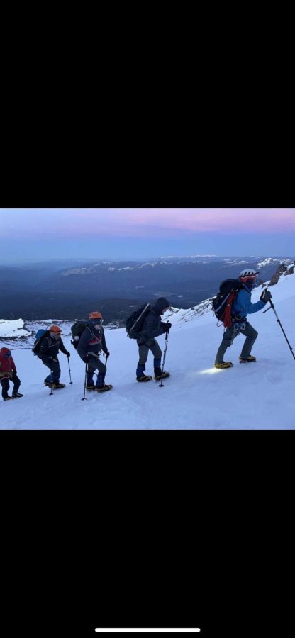 Tom Khal hiking Mount Shasta in his Patagonia jacket. Photo by Ben Lawrence. 