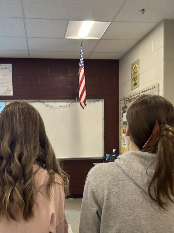 State High students standing for the U.S. Pledge of Allegiance in the morning.  