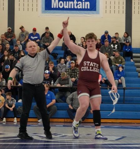 Nicholas Pavlechko is announced victorious by the referee after earning himself a pin against Central Mountains own Brayden Blackwell. Photo courtesy of Raylene Mellott.