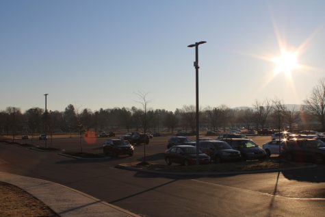 A sunrise illuminated student vehicles in the parking lot by North Field, the site of the parking conflict during the 7 AM hour, before the lot filled up. The photo was taken at roughly 7:50 on February 14, 2023.