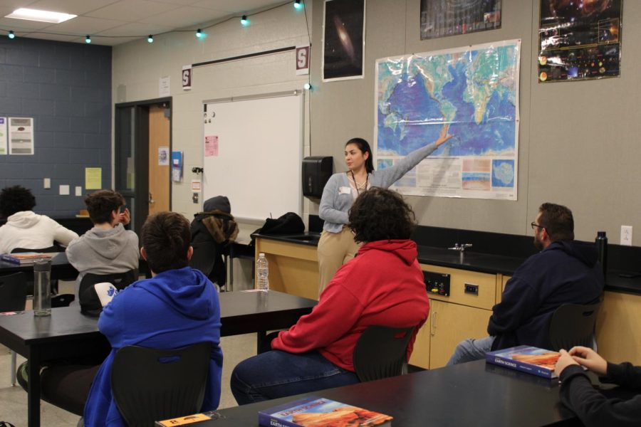 Gabrielle Basiliko educates her students about tectonic plates.