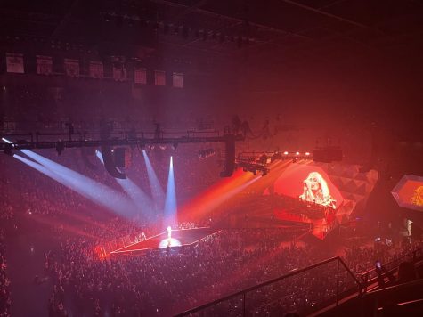 Carrie Underwood under red lights performing at the BJC. Photo courtesy of Carly Erickson.