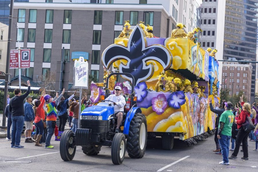 A Mardi Gras float rides through New Orleans as people celebrate Mardi Gras of 2017.