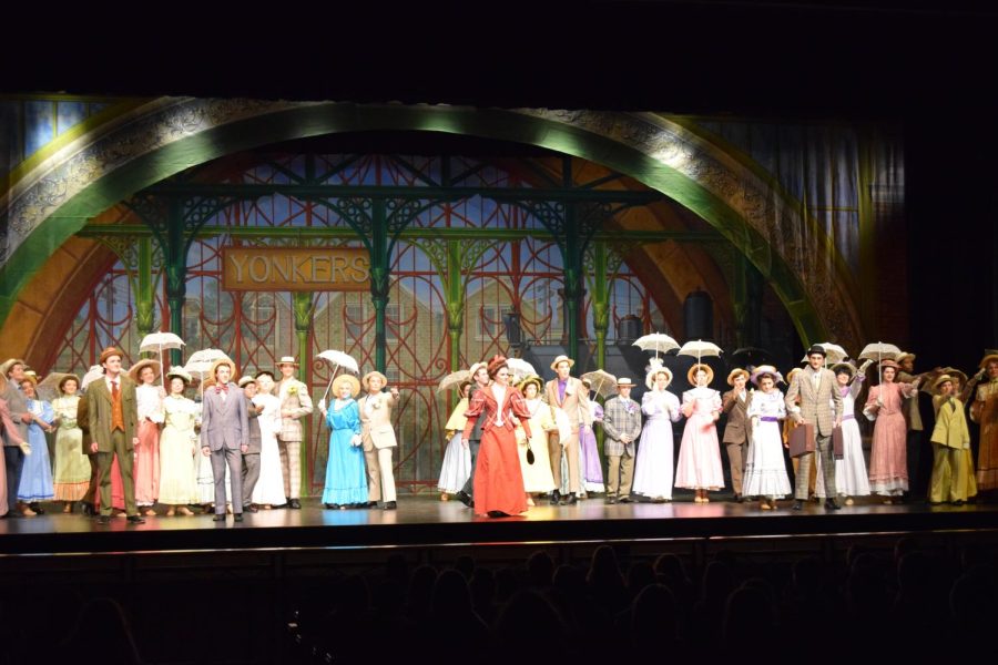 The cast preforming the scene Sunday Clothes during the show.