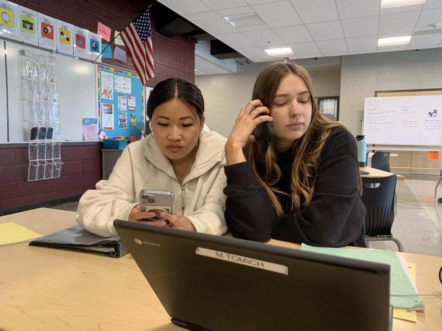 Seniors Jenna Jordan (left) and Mazzy Tomich (right) struggling to work through assignments.