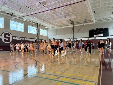 Freshmen and Sophomores dancing to the Cotton‐Eyed Joe at Froshmore in the big gym at State High on April 15th.