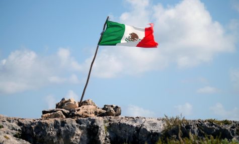 The Mexican flag stands tall to represent their strong win over the French.