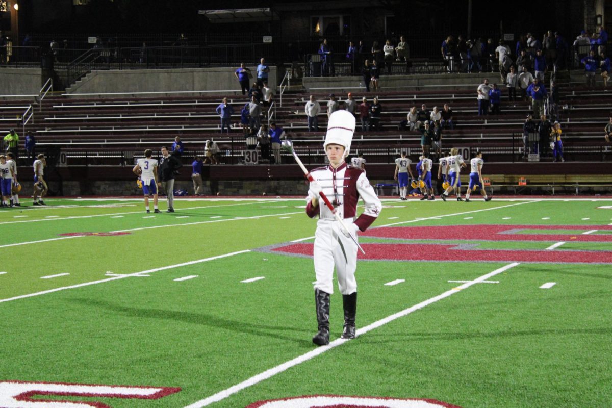 Head drum major, Joshua Carlson, marched with the band onto Memorial Field. Photo taken on Sept. 1, 2023.