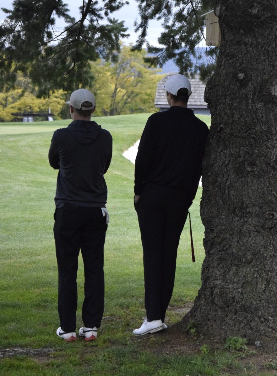 Seniors AJ Corson (Left) and Maxwell Wager (Right) watching Sam Shaner and his group play the final hole of the match, and in turn, the final hole of their high school golf careers.