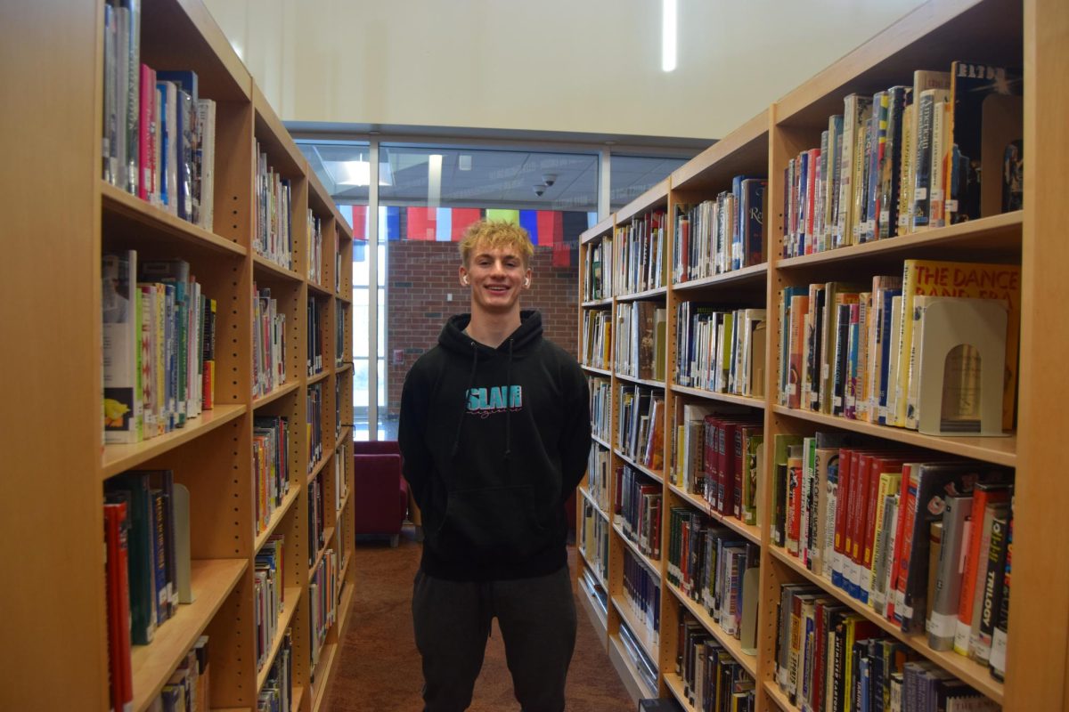 Photo of Ty Salazar in State Highs Library. 