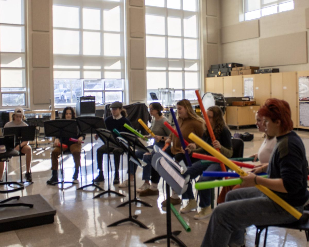 Members of State High Boomwhackers practice together before school. 