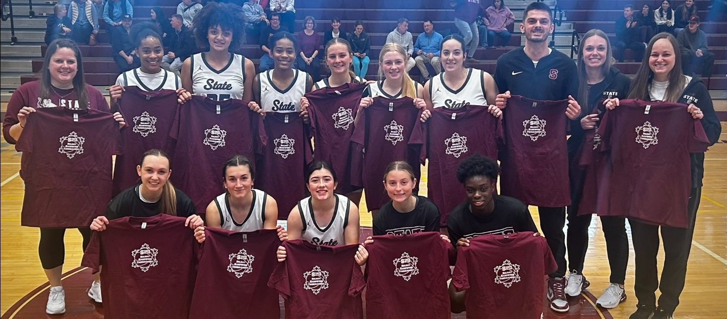 The State High Girls Basketball Team posing for a picture after the tournament with their championship t-shirts. Photo courtesy of the State High Athletic Department.