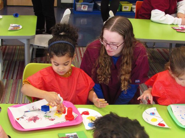 State High Students engage in hands-on interaction with the preschoolers