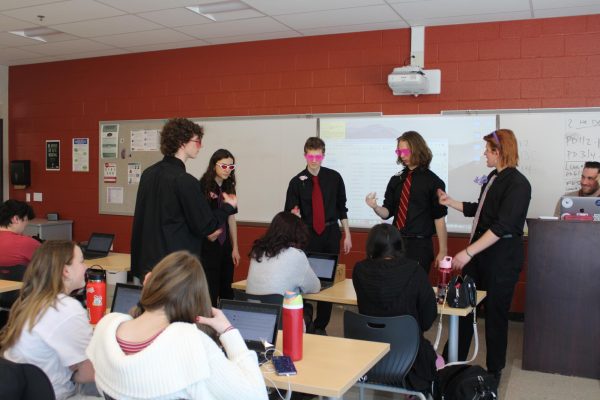 Vocal Valentine group sings to student